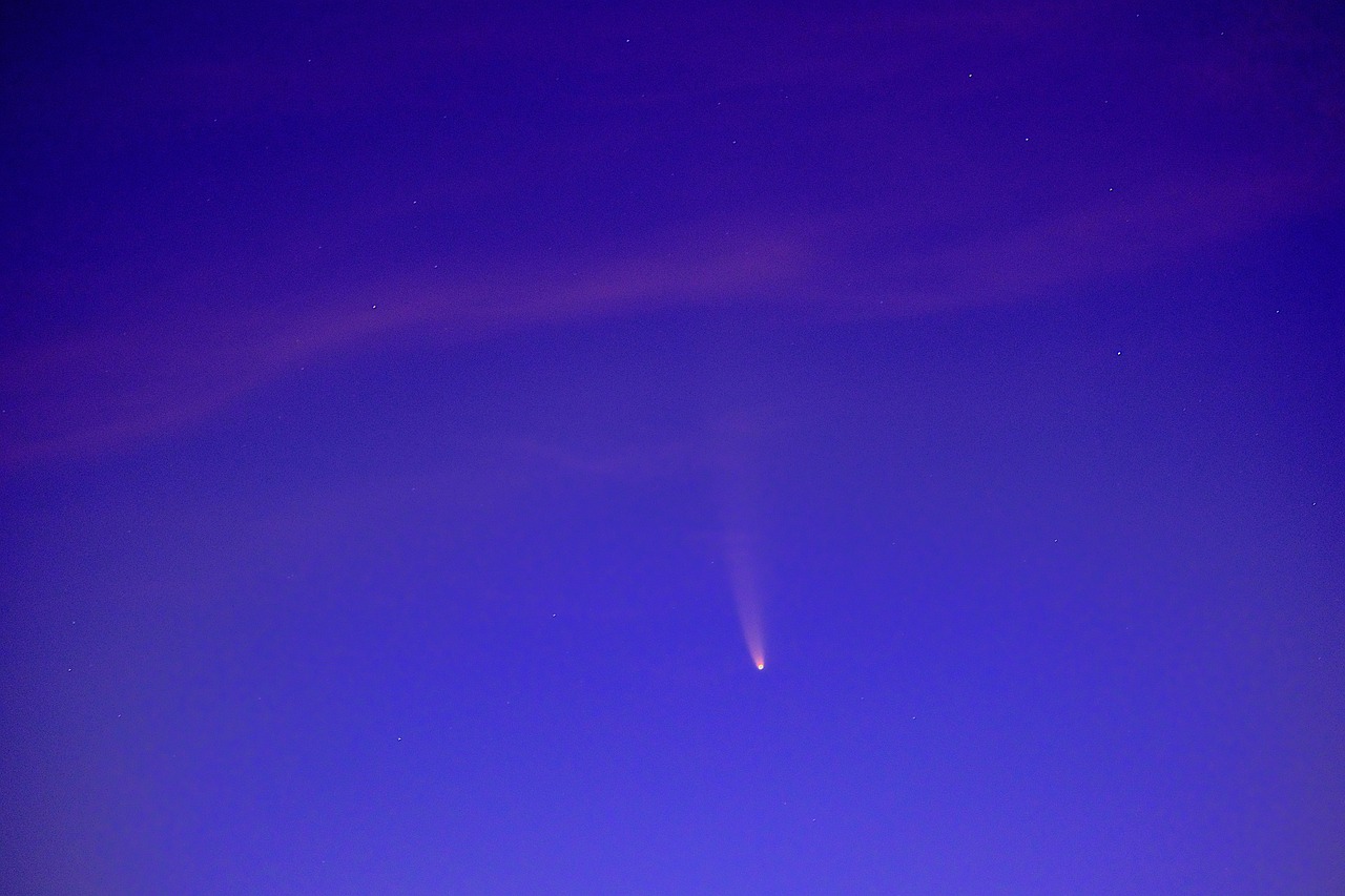 A comet streaking across the night sky.